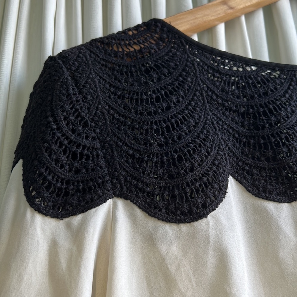 Club Monaco - size large - white and black statement blouse